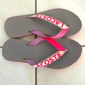 LACOSTE “like new” hot pink flip flop sandals